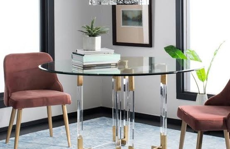 round-glass-dining-table-acrylic-legs-gold-brackets