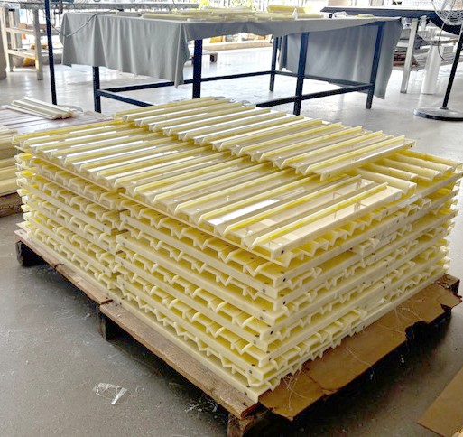 yellow-marble-acrylic-mahjong-racks-stacked-pallet